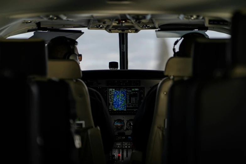 the interior of an airplane with its two instruments and controls