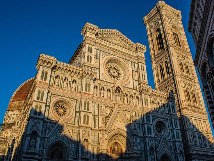 a cathedral in europe with a blue sky above