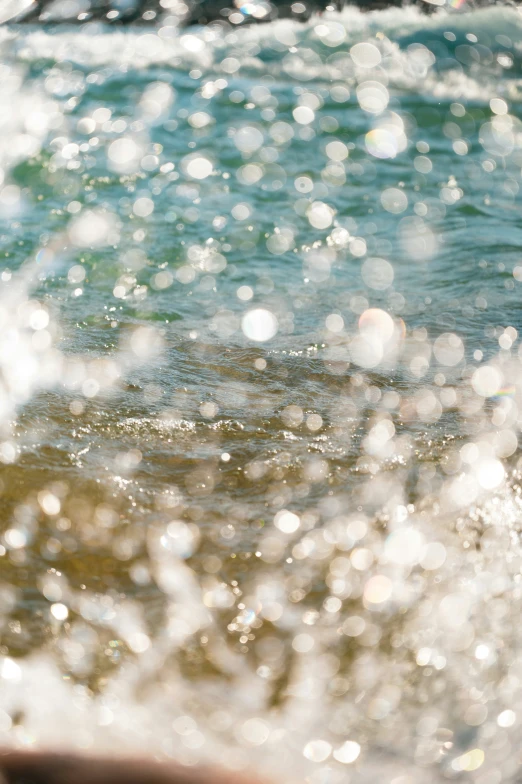 a surfer is looking at some waves with the light on