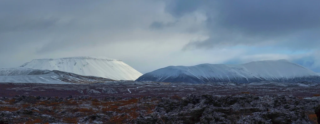 a small area with mountains and snow on them