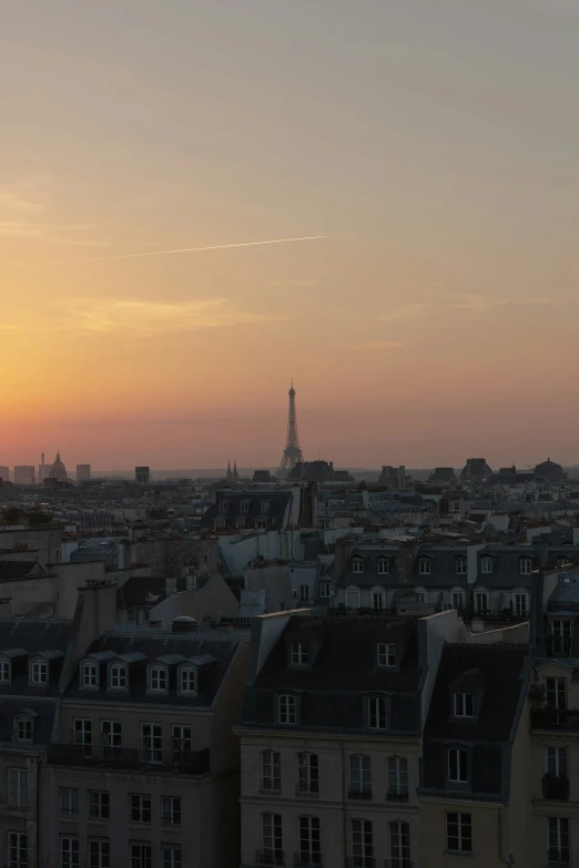 an evening view of the city with tall buildings