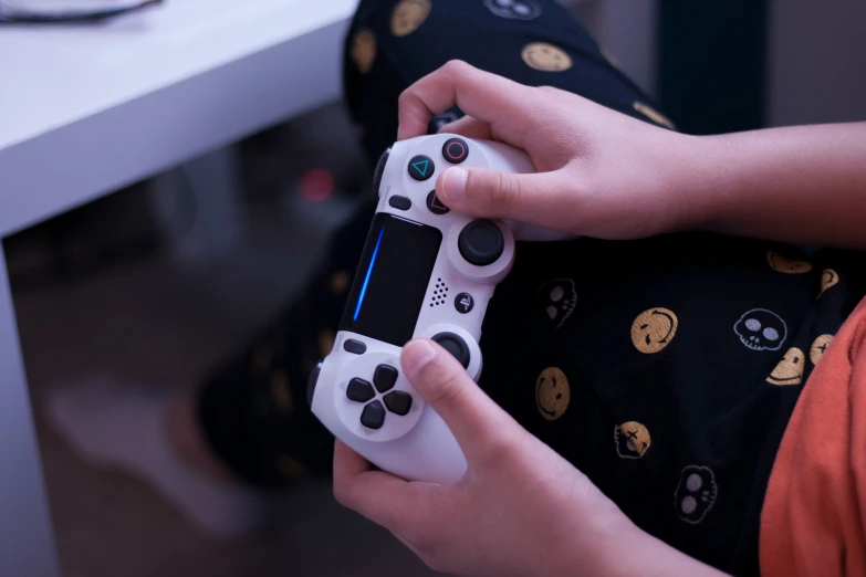 a child playing with the wii remote controls