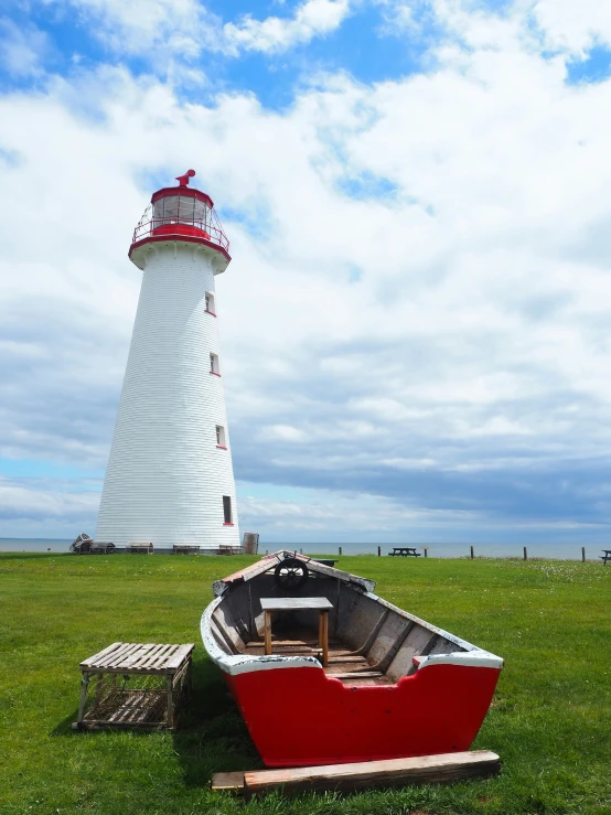 the white and red boat is out in the open