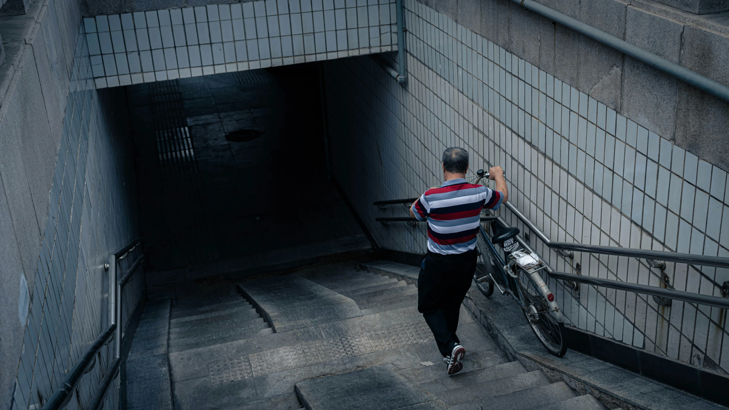 a person that is walking down some steps