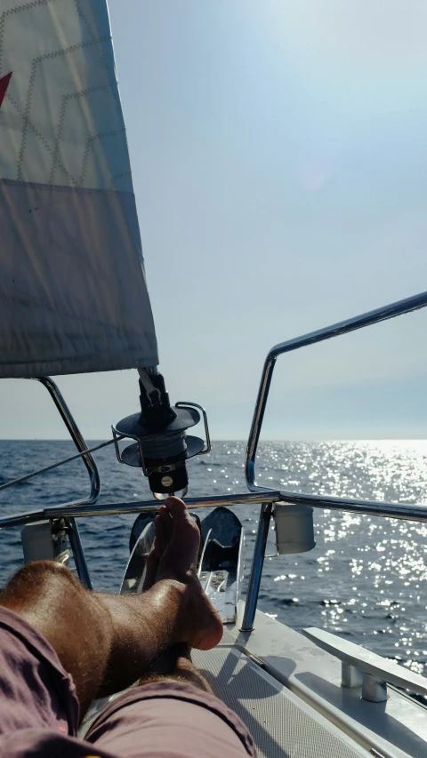 two people who are sitting on a boat