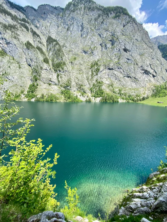 a large body of water with lots of rocks near it