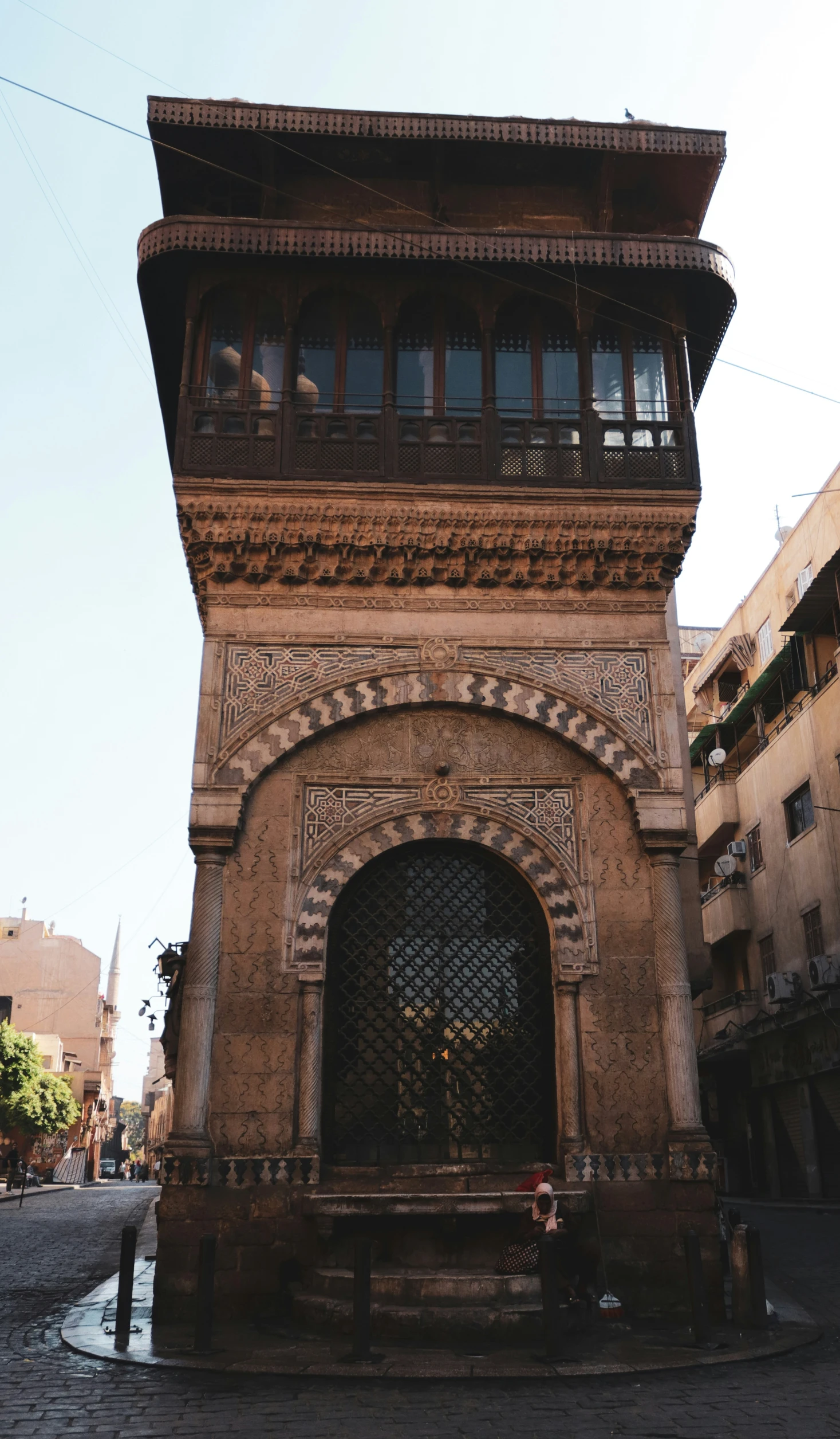 a building made of bricks and stone on the street