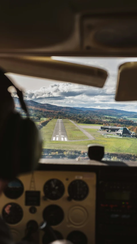 a view out the cockpit of a small plane as it is being driven