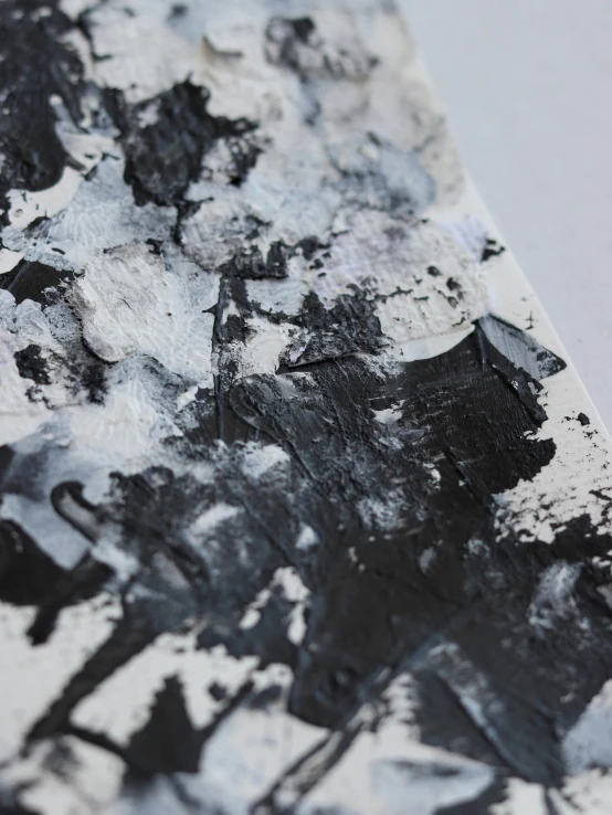 a large piece of white and black paint
