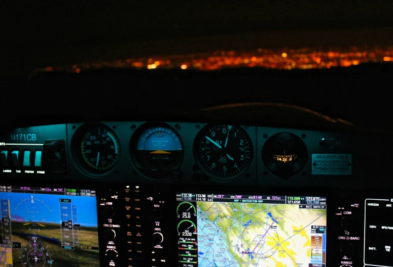 an airplane dashboard shows different times at night