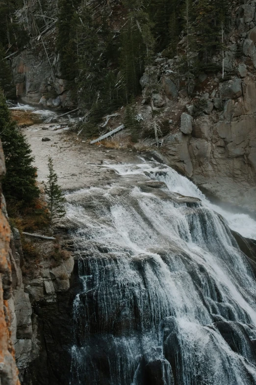 there is an open waterfall going up on the mountain side