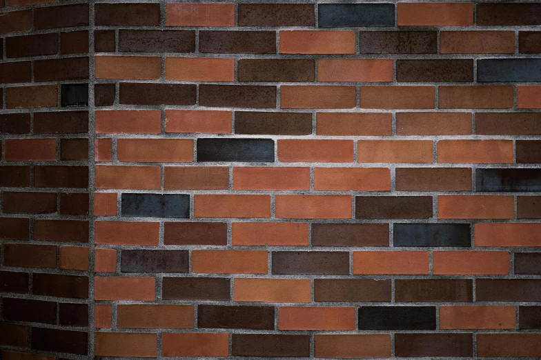 a brick wall with several small squares on it