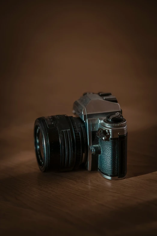 the old fashion camera with no lens is sitting on the table