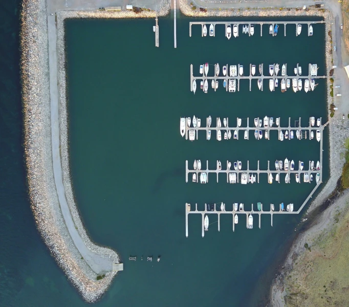 a large boat is docked at the dock