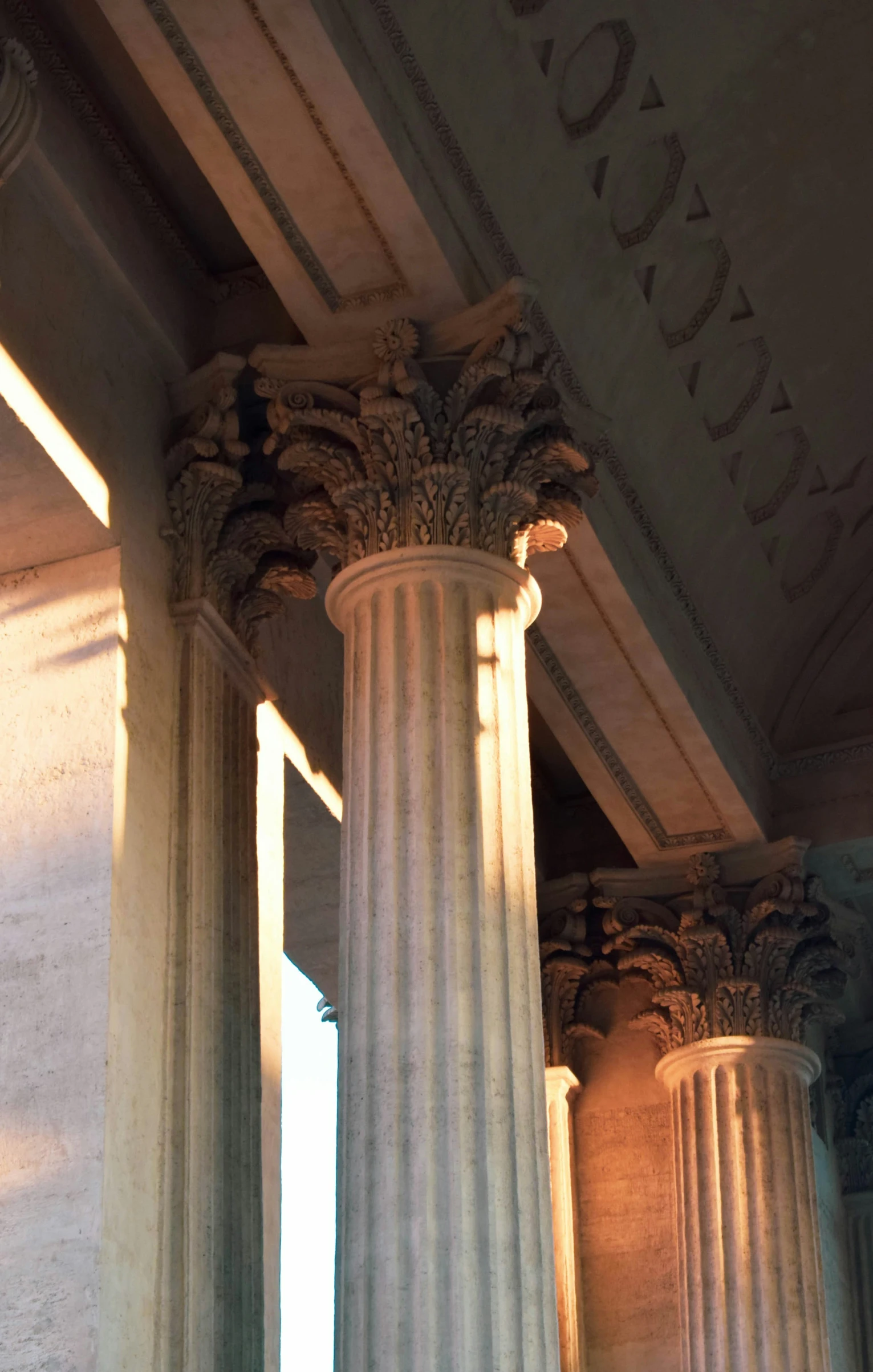 a row of stone pillars with pillars below