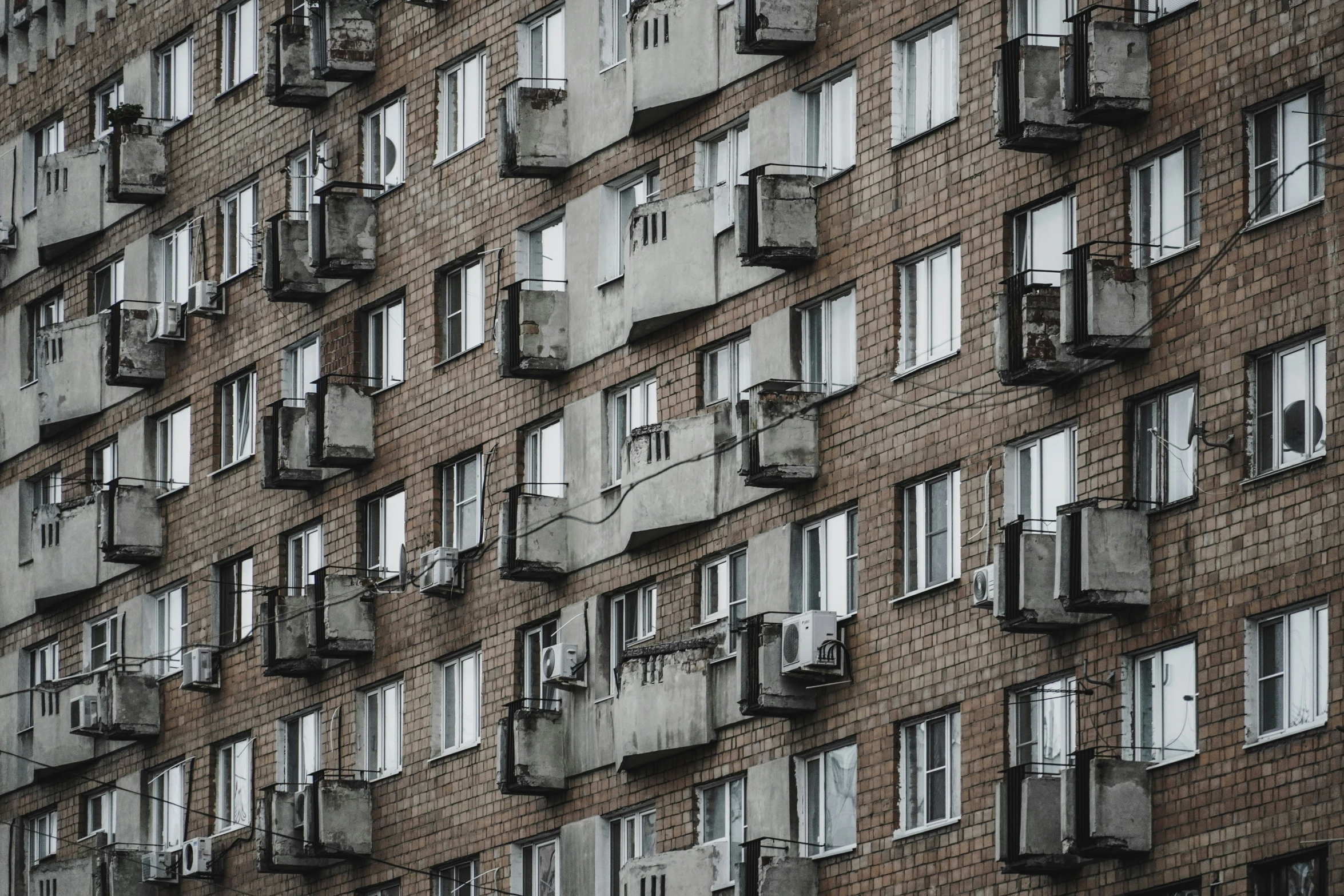 many windows are attached to the side of a building