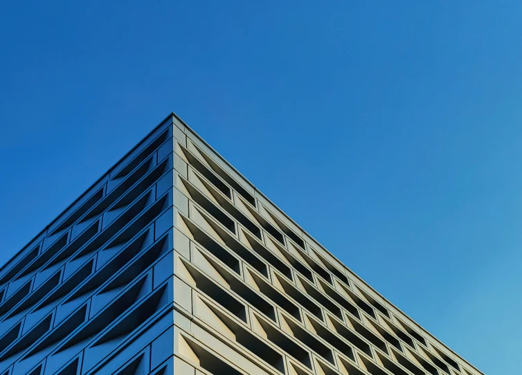 a tall building that is next to a street