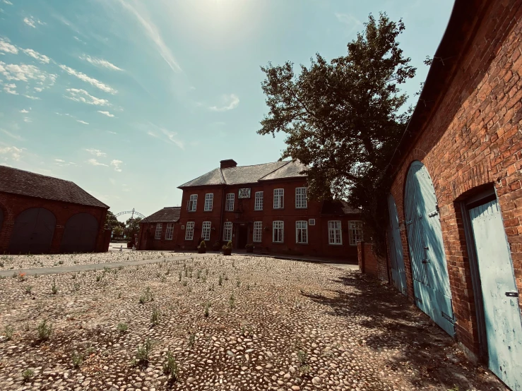 an image of a house and tree that is outside