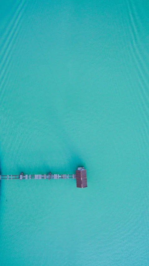 a red and white paddle boat and some water