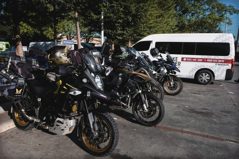 there are many motorcycles parked side by side