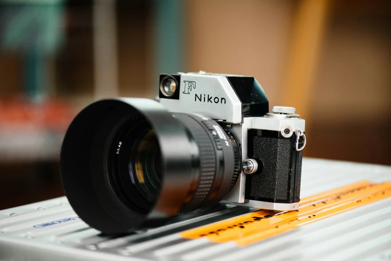 a camera and other items are on a table