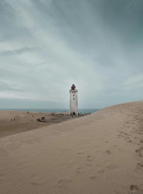 this is a lighthouse in the middle of the sand dunes