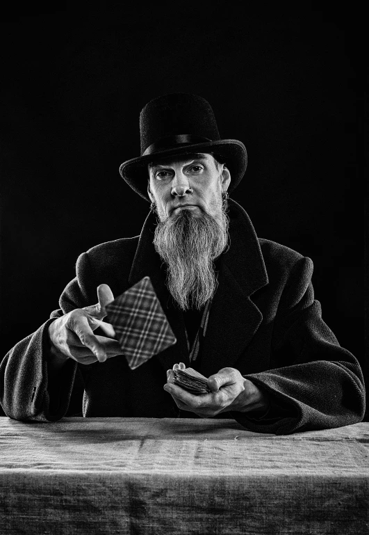 a portrait of a rabbi holding a box