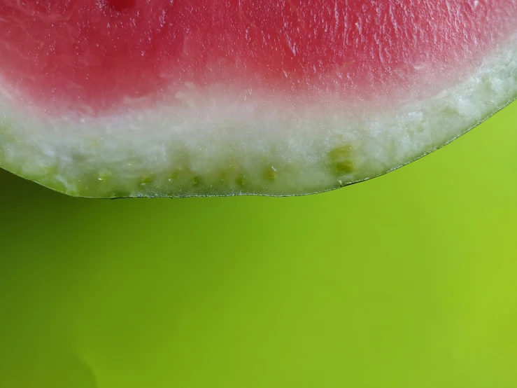 a close up po of a piece of watermelon