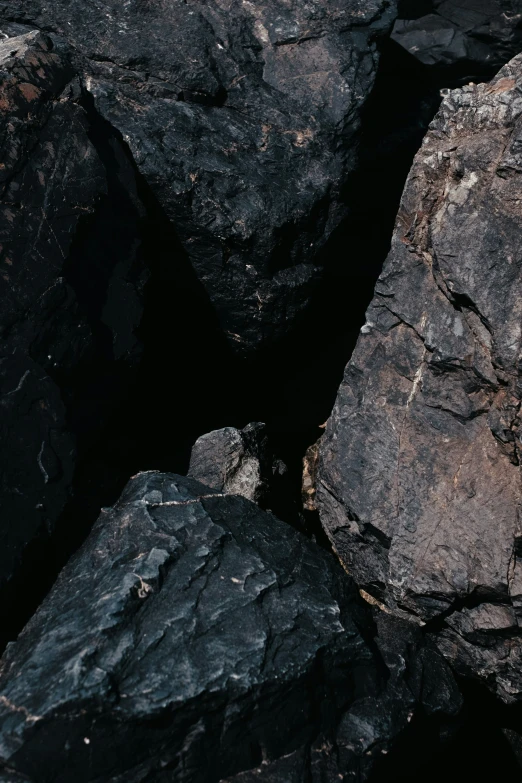 many large rocks with many small ones on them