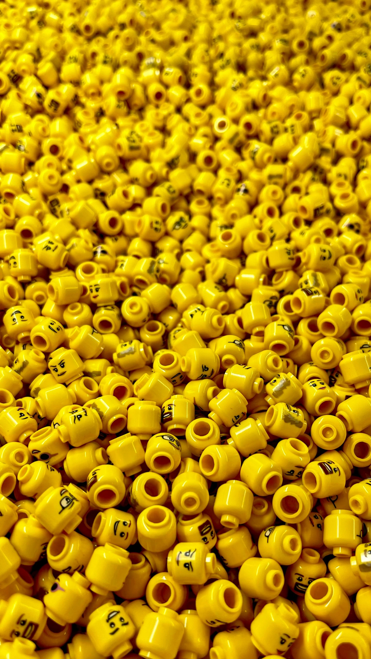 a yellow table covered with lots of yellow beads