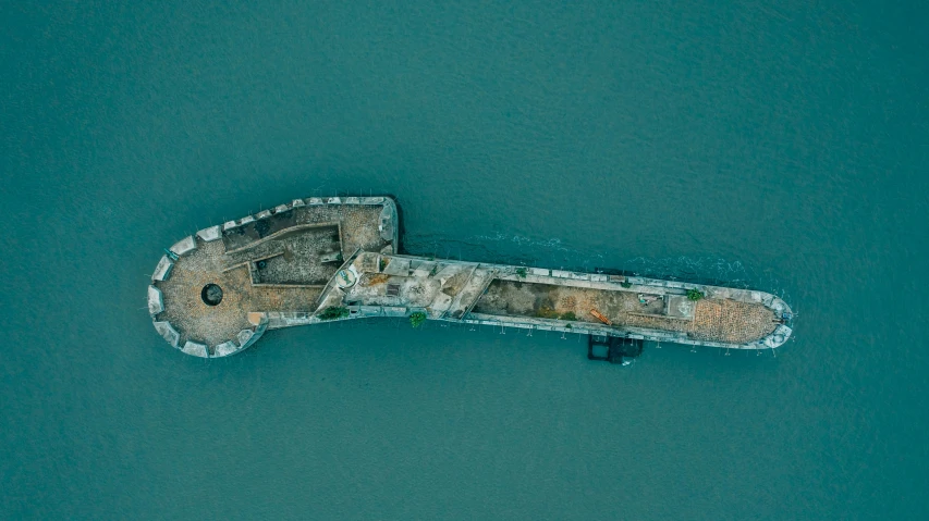 an old concrete dock in the water