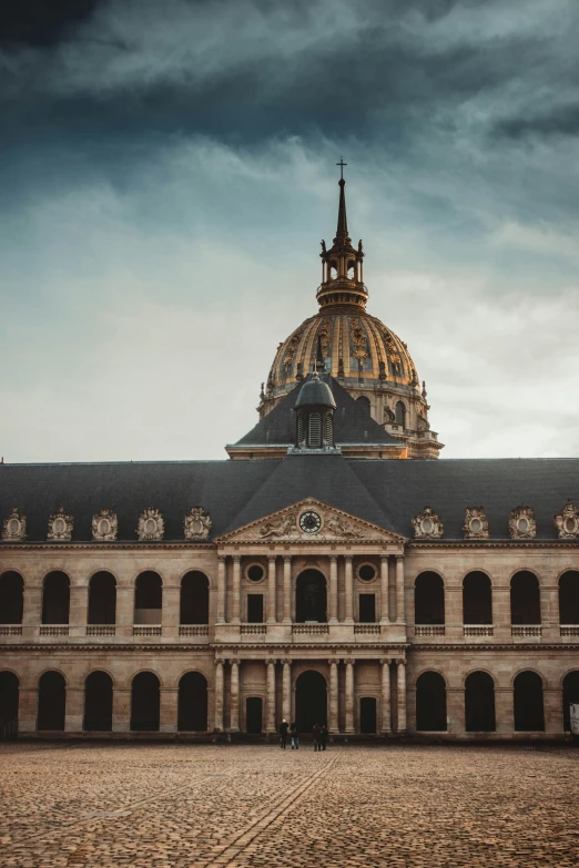 a large building with a dome top on top of it