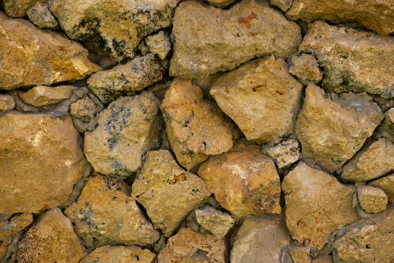 a close - up of some large rocks that have been made into a wall