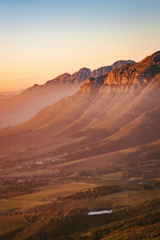 a valley with very low mountains at the top