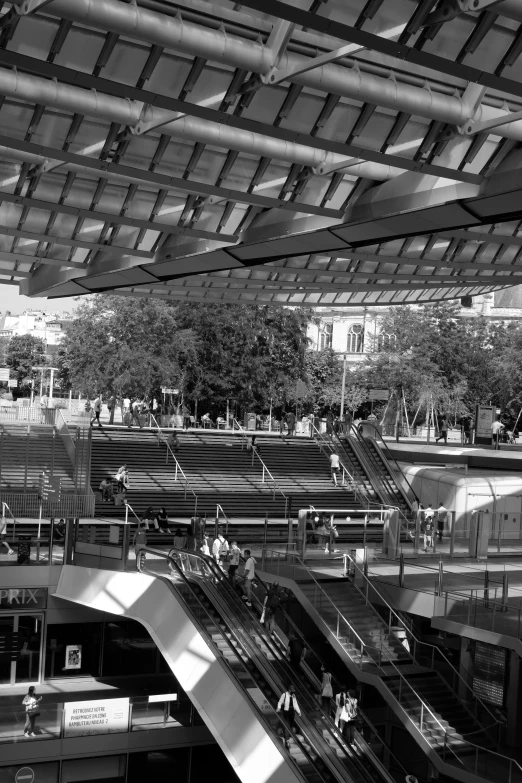 a black and white po of an escalator