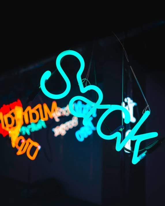 a neon sign is advertising social media