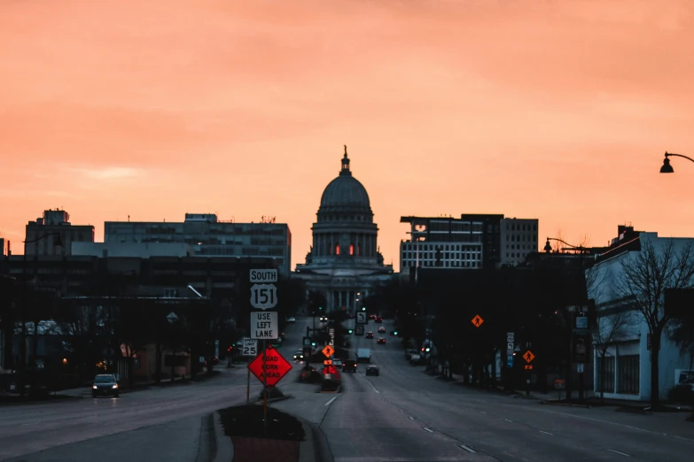 a small city street in the sunset