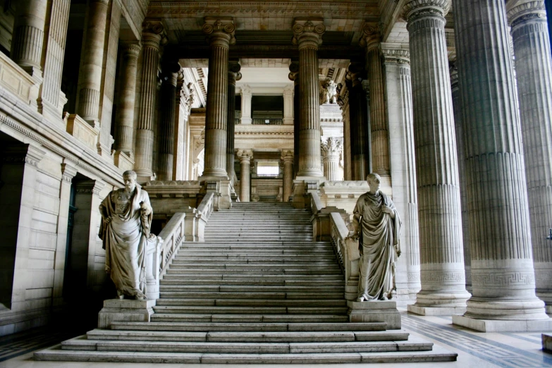 some very beautiful statues in the middle of some stairs