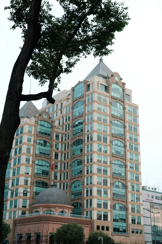 an upward view of a very high rise building