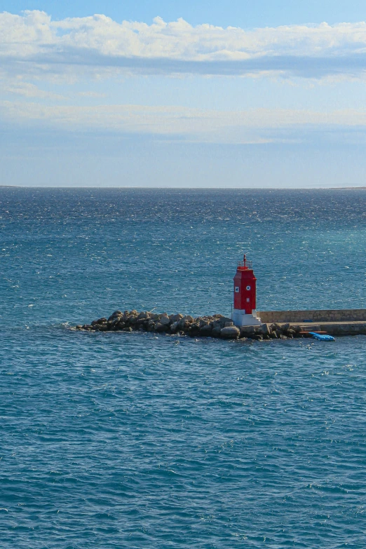 a buoy is on the edge of the water