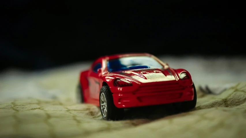a toy car is seen here in a close up view