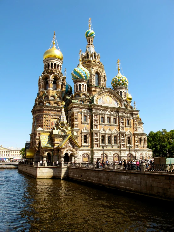 the building with many domes is near the water