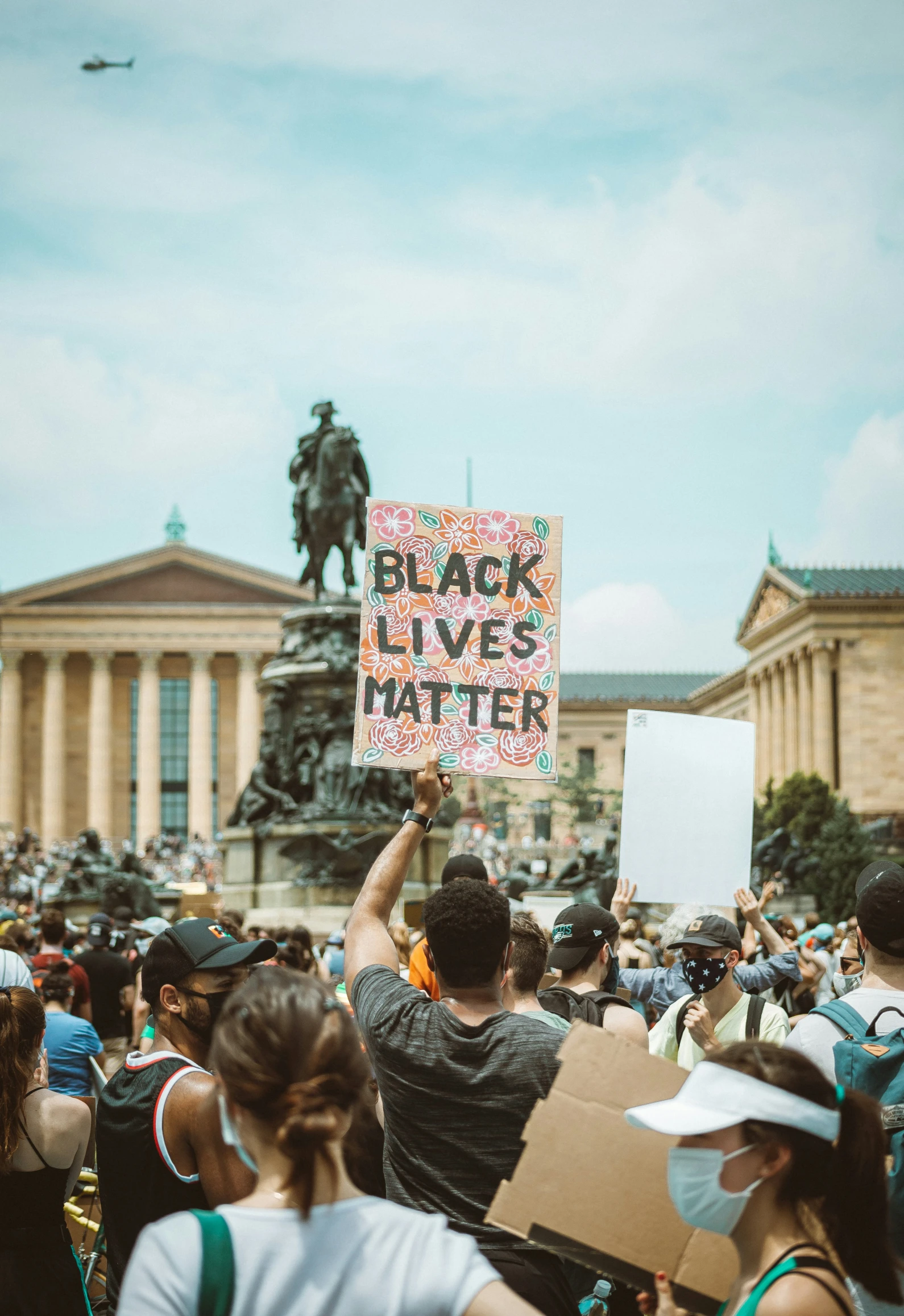 there are a lot of people marching around with signs