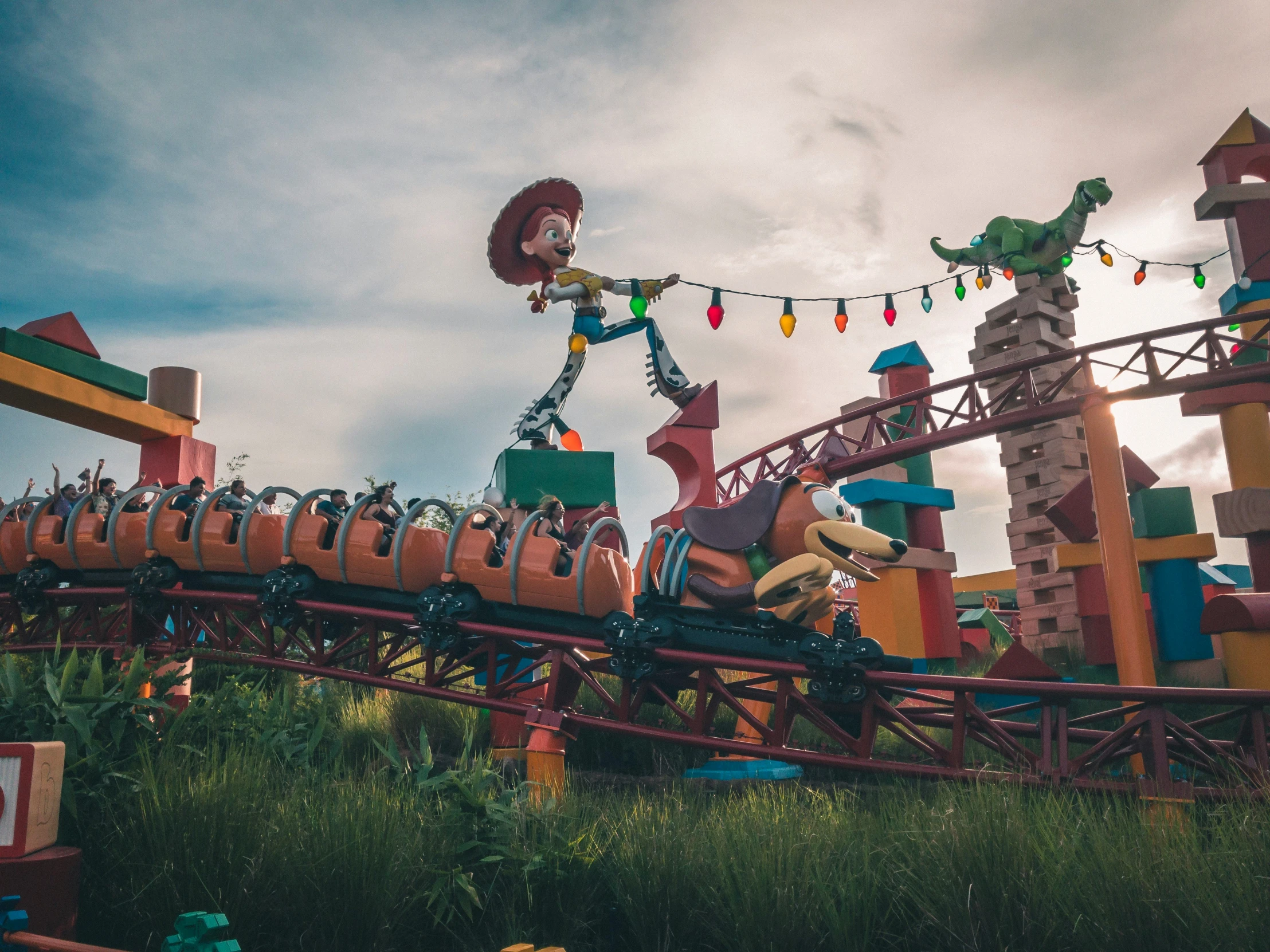 a roller coaster has the theme of disney's goofy land