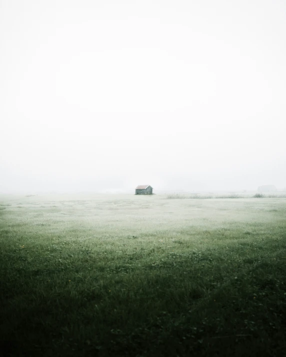 a house is in the fog of the day