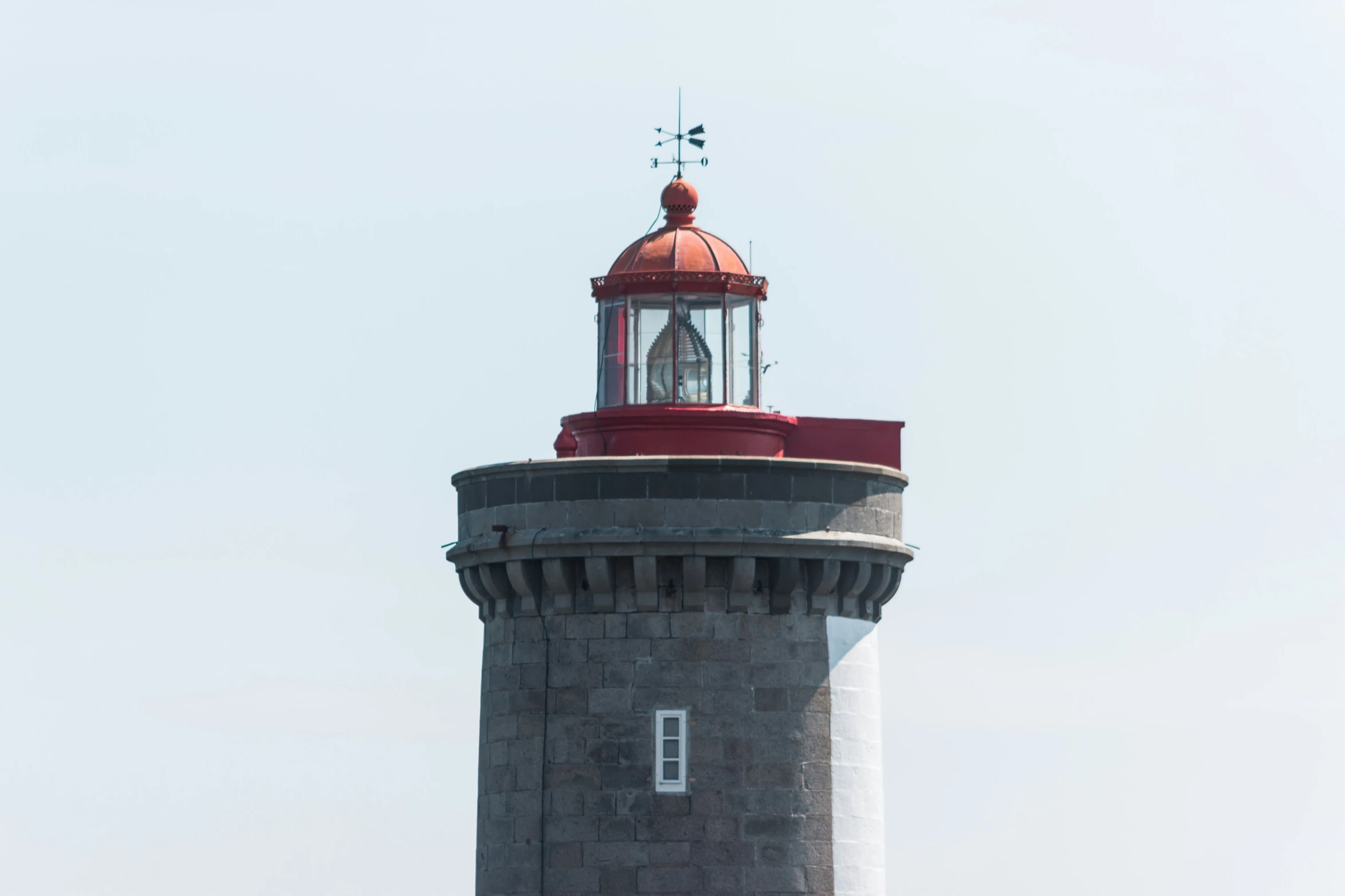 the red and white lighthouse on a clear day