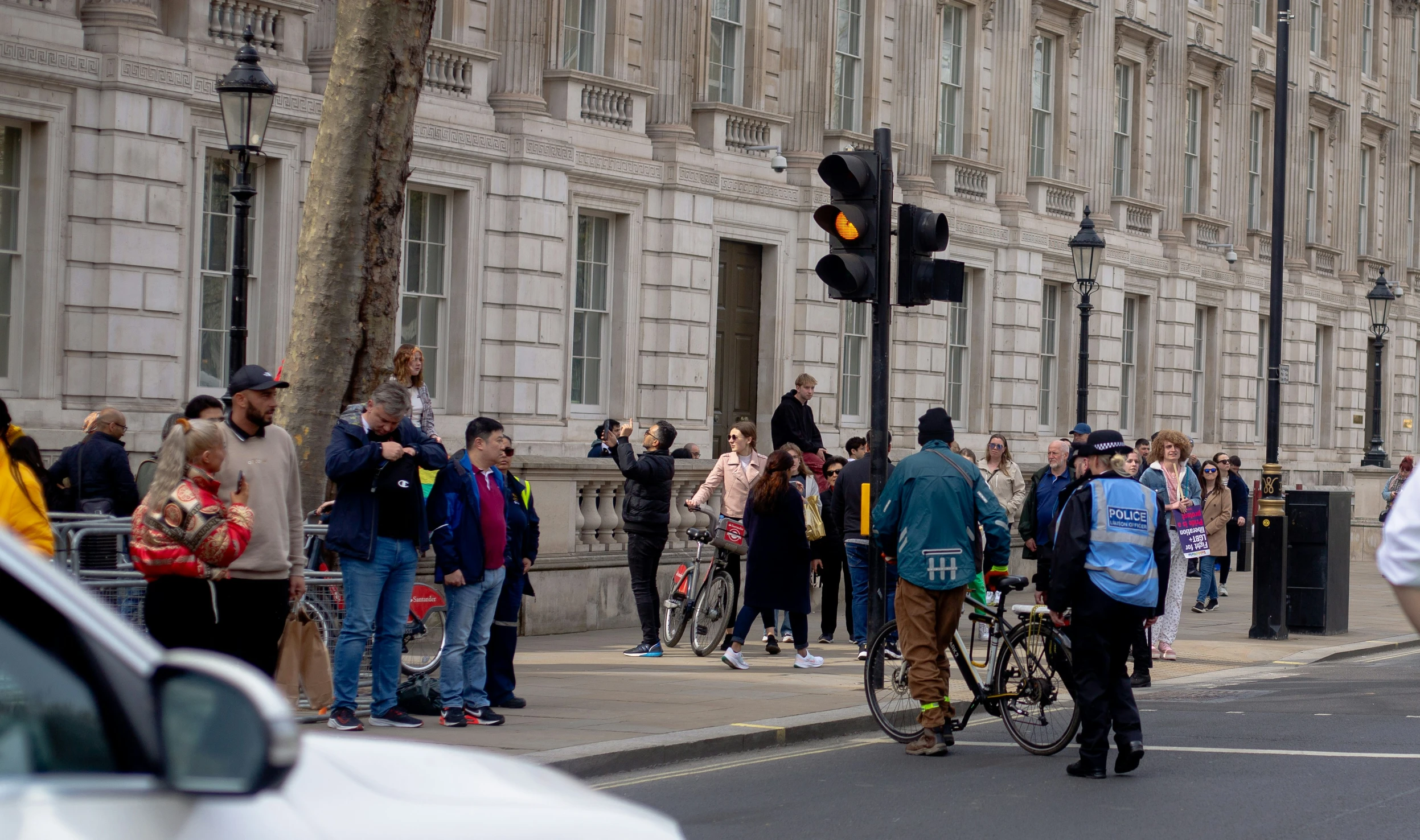 there is a group of people crossing the street