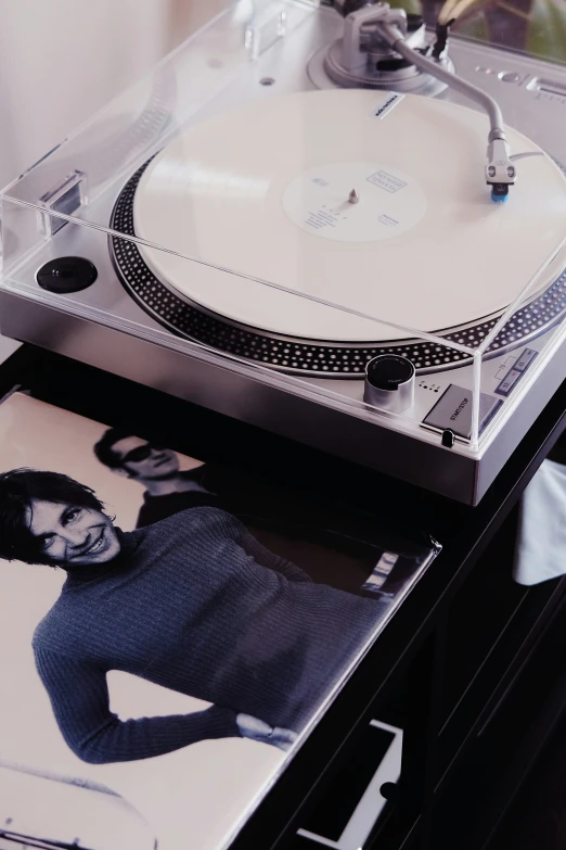 there is a turntable that has a woman on it