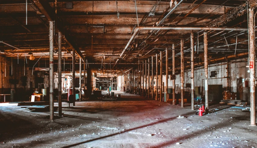 a room with several pipes in it and no doors