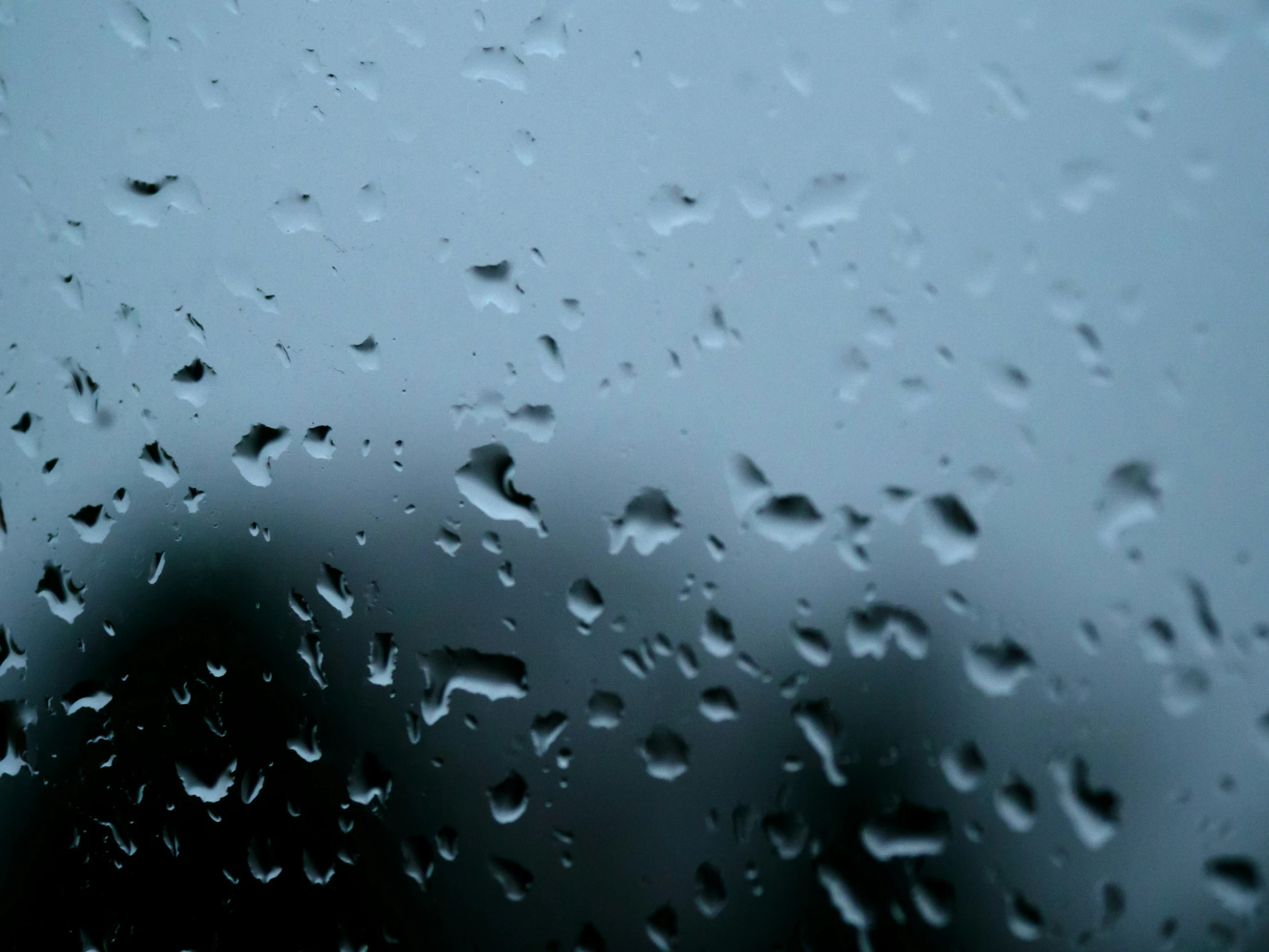 rain drops on the window of a car